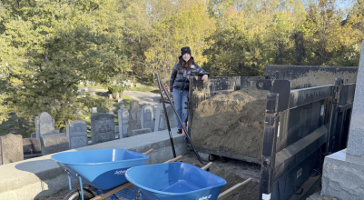Kelly Schwimer, executive director of Jewish Cemetery & Burial Association, participates in the cleanup project at Beth Abraham Cemetery in the South Hills on Sunday, Oct. 26, 2025. The volunteer event was part of several community projects done to commemorate the seventh year since the Tree of Life Synagogue attacks on Oct. 27, 2018. (Tim Grant/Post-Gazette)