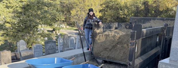 Kelly Schwimer, executive director of Jewish Cemetery & Burial Association, participates in the cleanup project at Beth Abraham Cemetery in the South Hills on Sunday, Oct. 26, 2025. The volunteer event was part of several community projects done to commemorate the seventh year since the Tree of Life Synagogue attacks on Oct. 27, 2018. (Tim Grant/Post-Gazette)